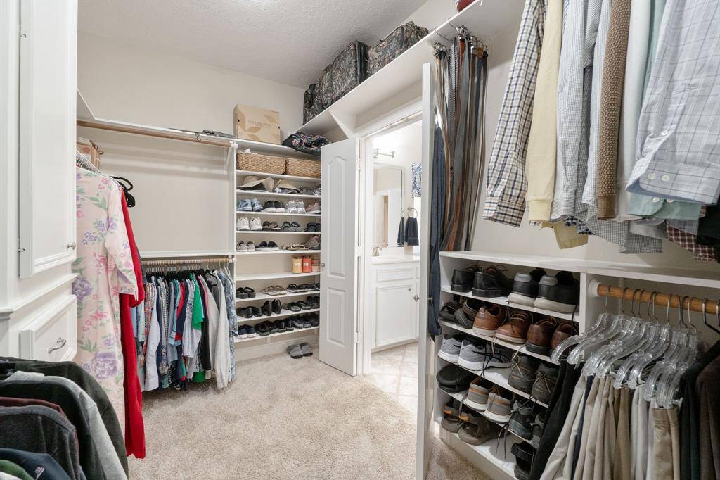 The home owner has added extra shelving to keep everything neat and organized.