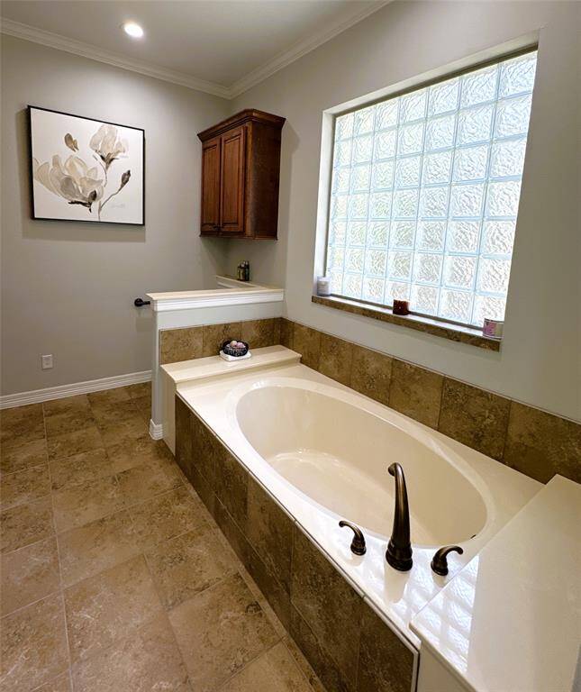 Luxurious soaking tub for ultimate relaxation.