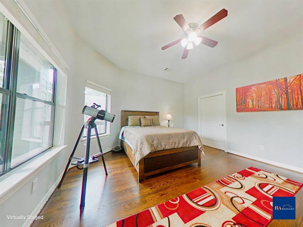 Upstairs secondary bedroom with private ensuite bath.