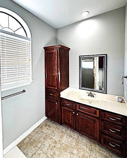 Private ensuite bath in the upstairs secondary bedroom.