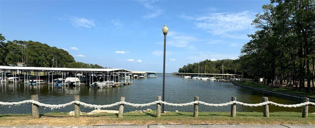 Enjoy the vibrant community marina with deep water access, featuring a convenient store, gas pumps, and rentable boat slips.