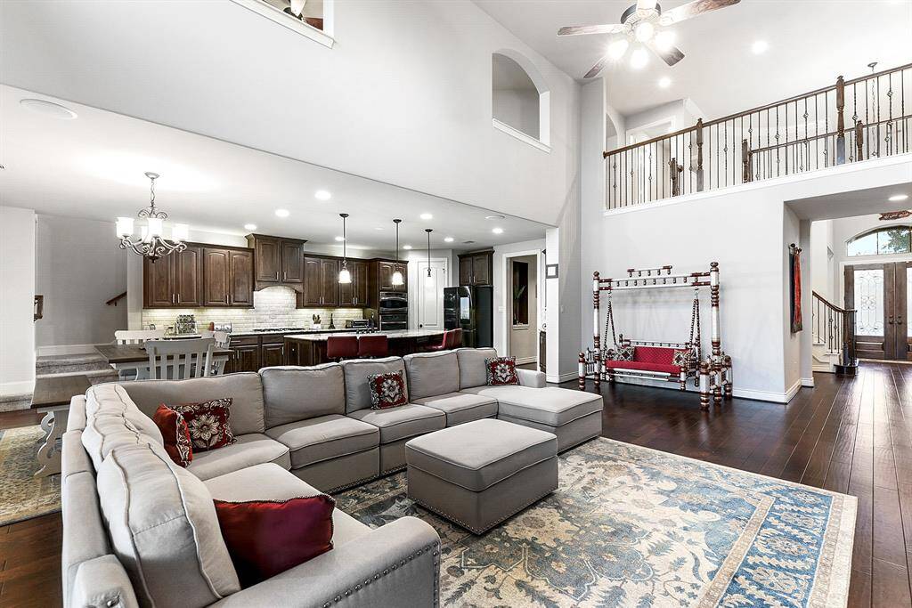 With plenty of space to accommodate all your living room furniture, this room can easily adapt to any style or layout you envision. Whether you prefer a cozy, intimate setting or an open, airy arrangement, this versatile space offers endless possibilities to suit your needs and design preferences.