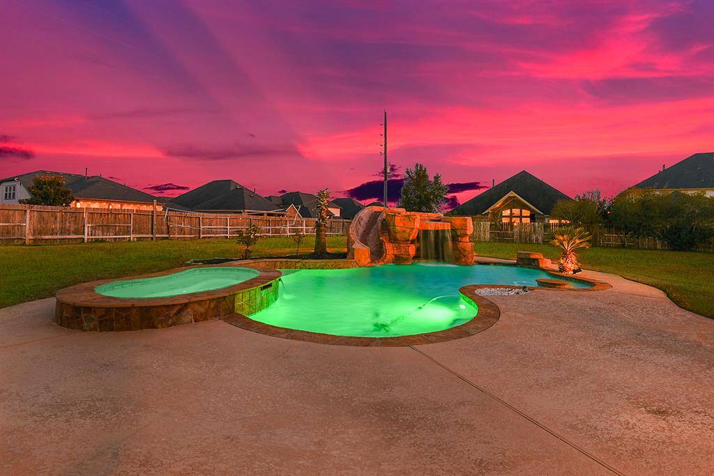 Experience a beautiful backyard oasis, ideal for entertaining and enjoying quality time with family and friends! This private retreat features cool decking all around, providing comfort and relaxation as you unwind in your own outdoor haven. With ample space and thoughtful design, it's the perfect spot for both relaxation and lively gatherings.