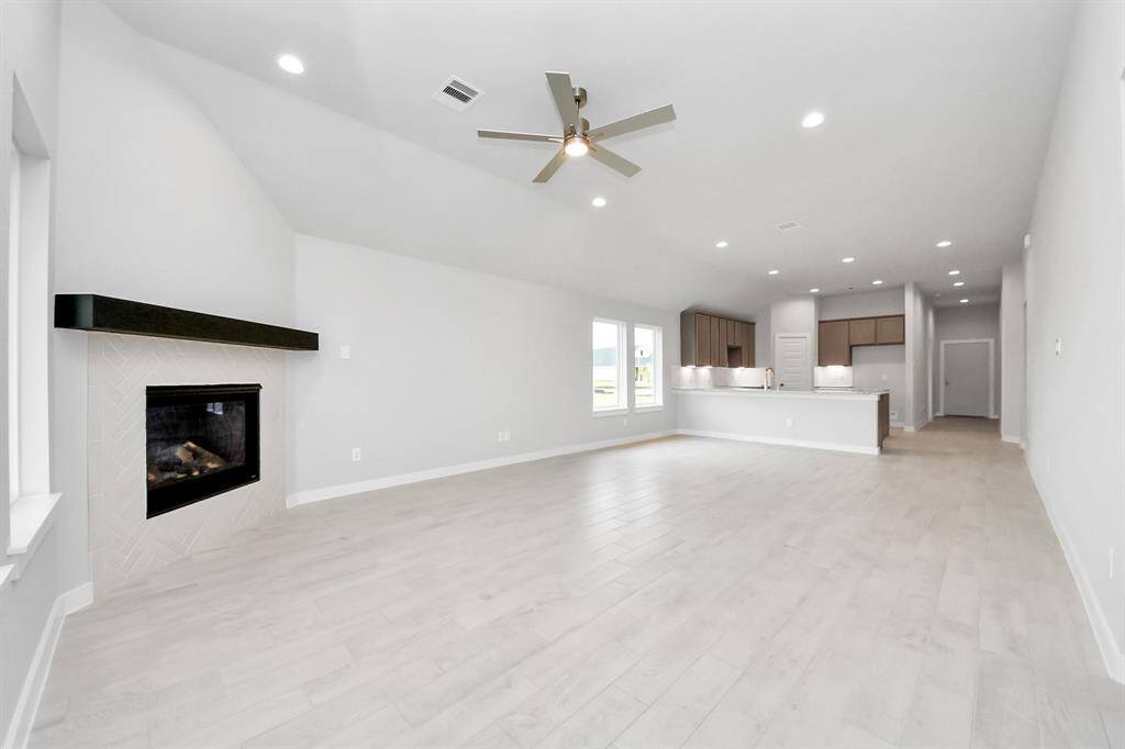 Take another glimpse into the heart of the home with this additional view of the family room—a sprawling space ready to accommodate all your gatherings.