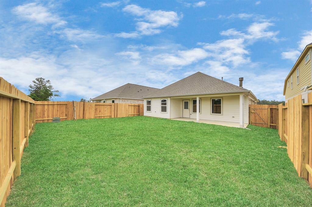 Backyard retreat, offering an abundance of space for kids to play and explore. The possibilities are endless in this outdoor haven, where the joy of open-air activities and family gatherings awaits.