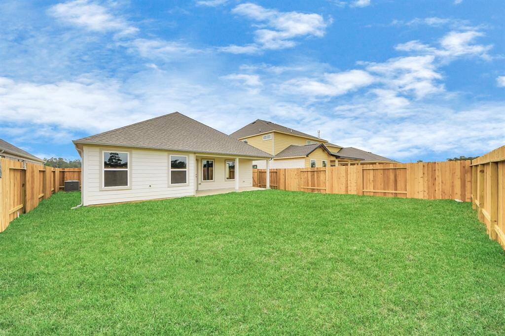Backyard retreat, offering an abundance of space for kids to play and explore. The possibilities are endless in this outdoor haven, where the joy of open-air activities and family gatherings awaits.