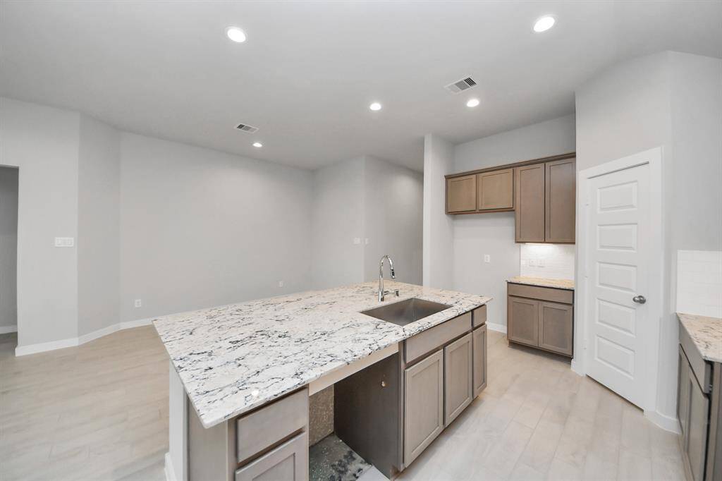 This generously spacious kitchen is a dream realized!