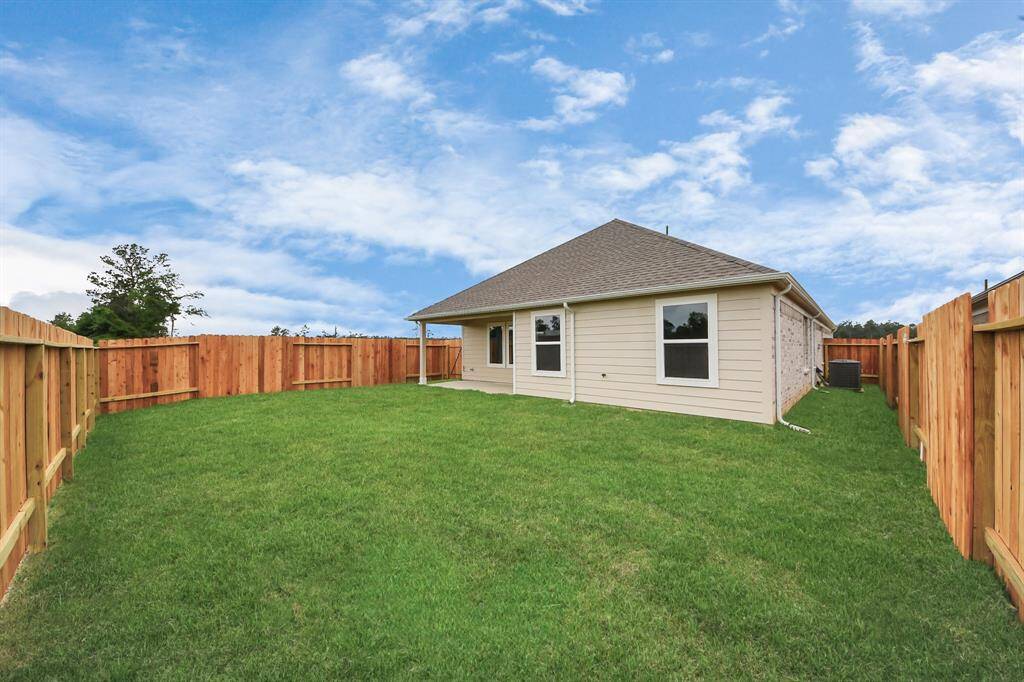 Backyard retreat, offering an abundance of space for kids to play and explore. The possibilities are endless in this outdoor haven, where the joy of open-air activities and family gatherings awaits.
