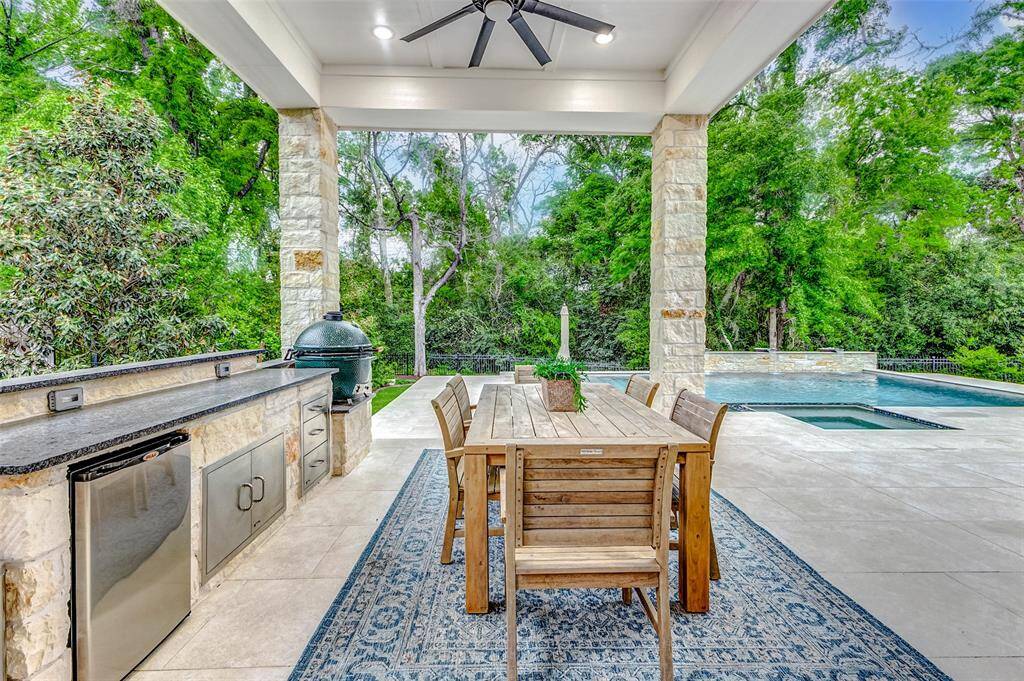 Just imagine relaxing here every day—surrounded by trees and nature, enjoying the peaceful ambiance from the comfort of your covered patio.