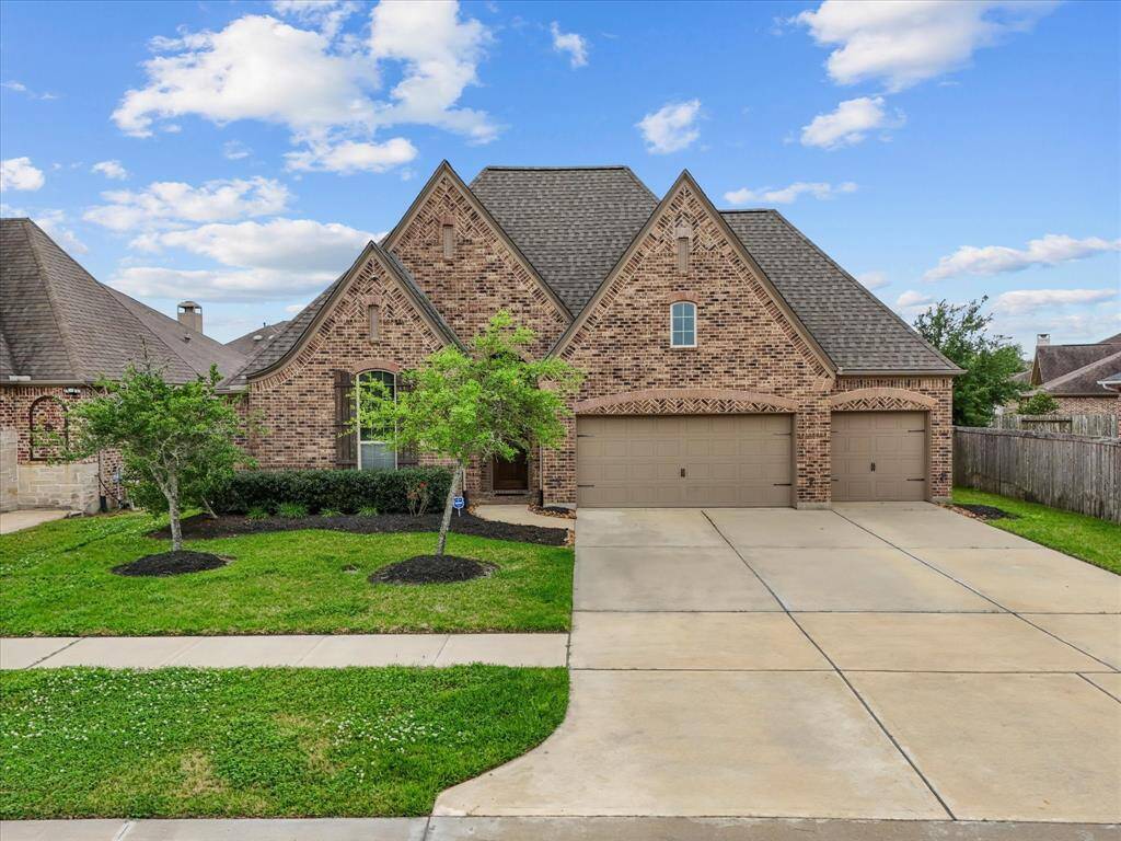 Welcome to 3110 Red Agave! Featuring a large 3 car side by side garage and ample parking!