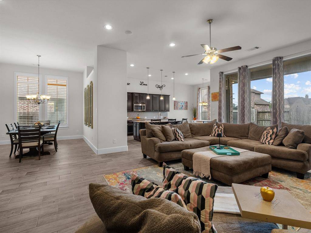 The oversized windows make for cheerful mornings. The house has 8ft. doors.