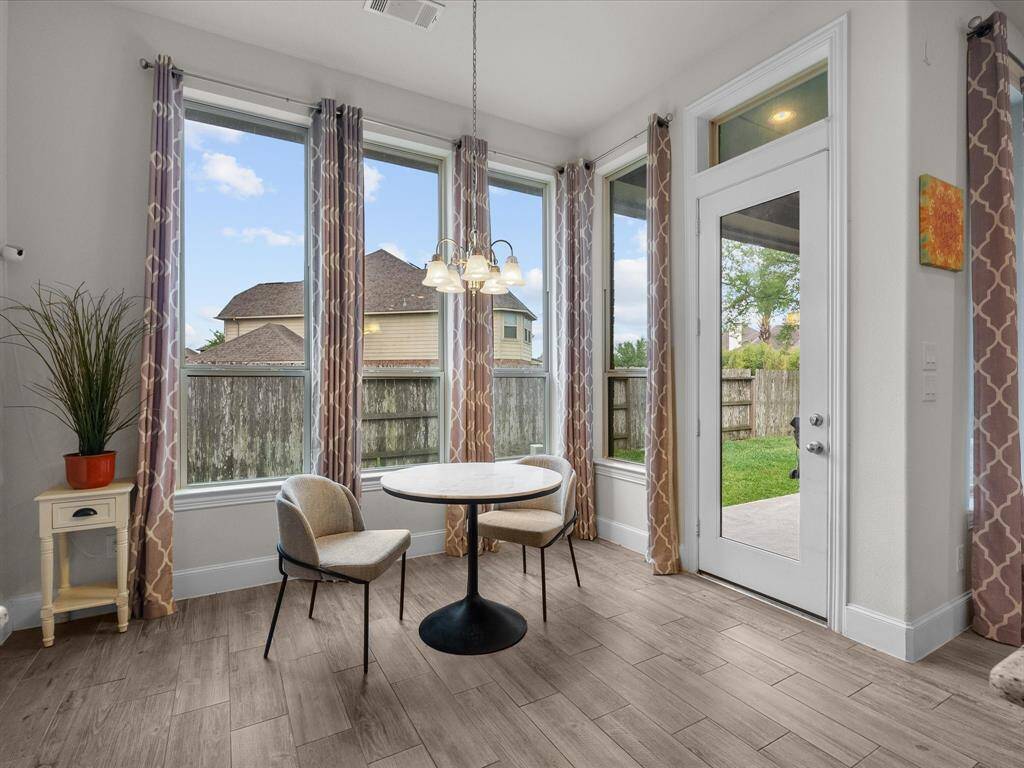 A breakfast nook has plenty of light for resetting your circadian rhythm over your morning cup of coffee.