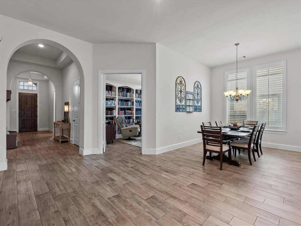 The family room looks into the dining area and study.