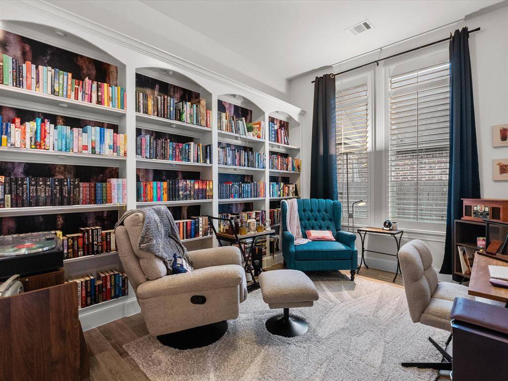 The library/study has floor-to-ceiling bookcases. It is a perfect place to read or be productive.