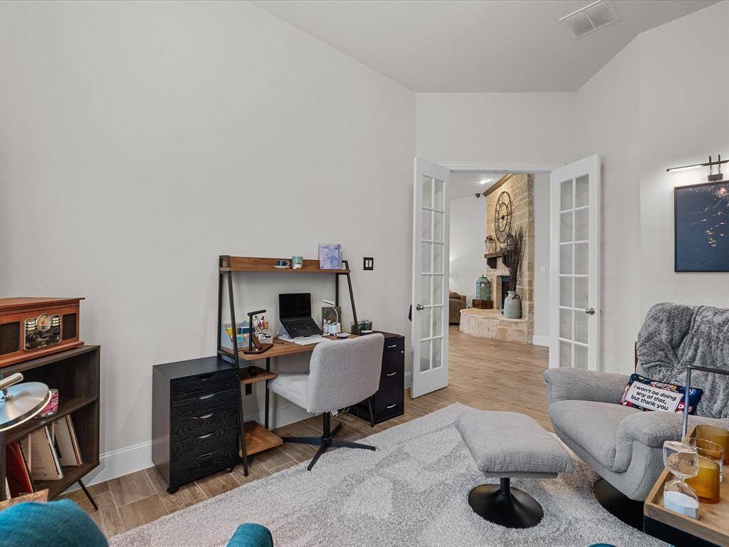 Looking out from the bookcase wall, you can see the study is roomy enough for work and play.