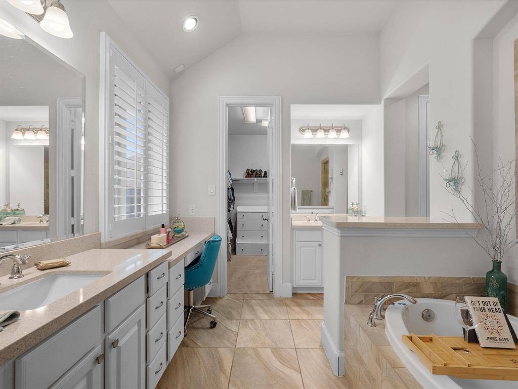 The primary en-suite is a fantastic place to pamper yourself and features huge walk-in closet!