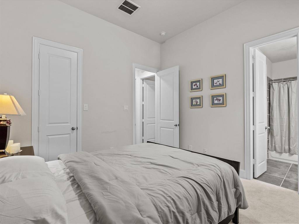 Bedroom 2 is spacious and features a large walk-in closet plus attached full bathroom!