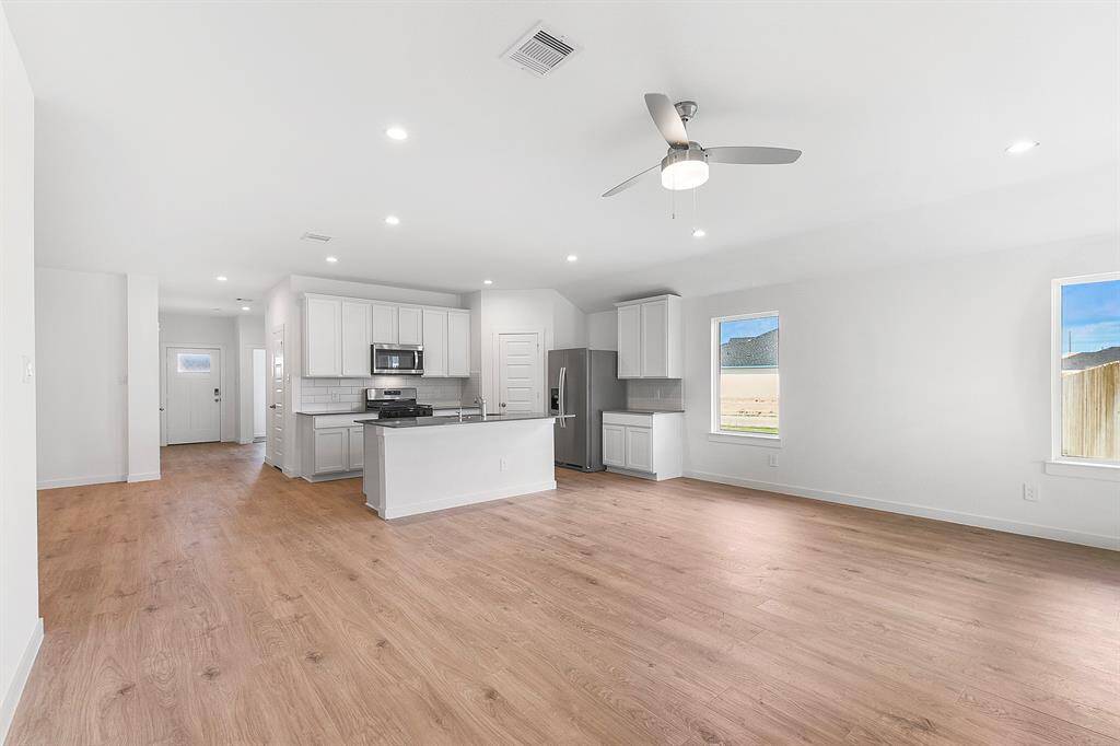 Another view of this open concept beautiful home. This living room is amazing!!