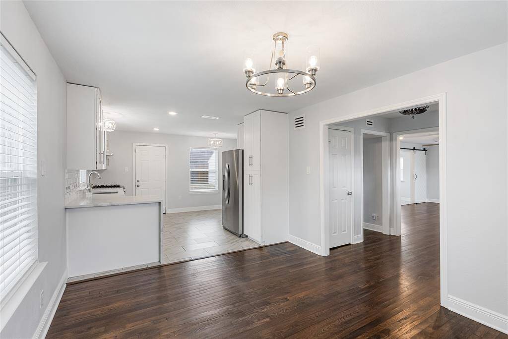 Elegant light fixtures and open concept design bring modern elegance to this charming home!