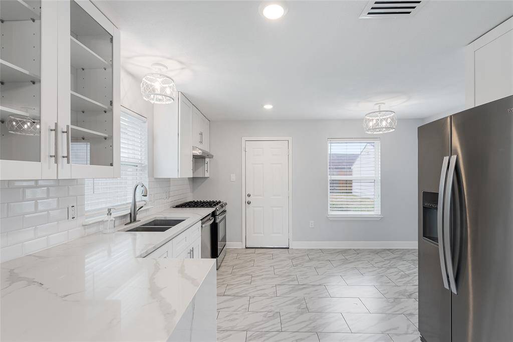 The kitchen feels endless with plenty of counter space to prep all your gourmet meals!