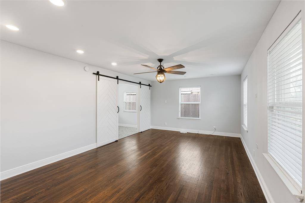This view shows the incredibly spacious design, and additional flex space right off of the living room!
