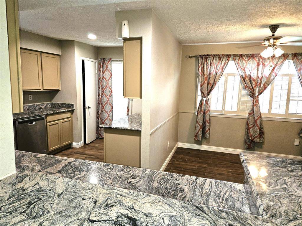 Open kitchen and dining area with a seamless view from the family room, perfect for entertaining.