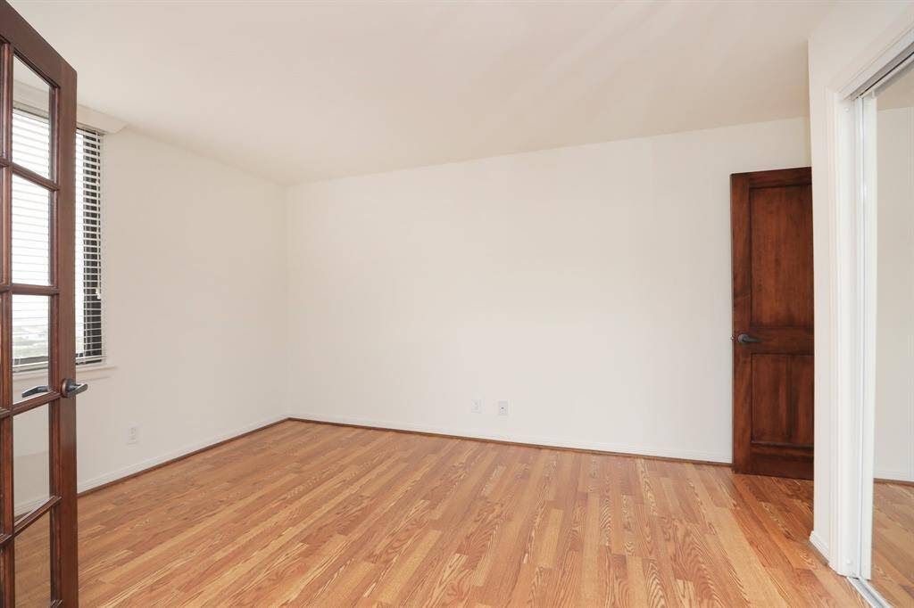 Secondary bedroom feels like a second primary bedroom with loads of space.