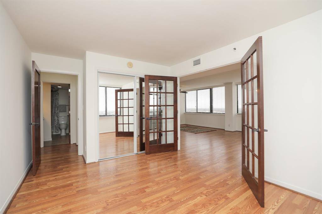 French door glass coverings could easily be installed for privacy. Very nice closet as well.