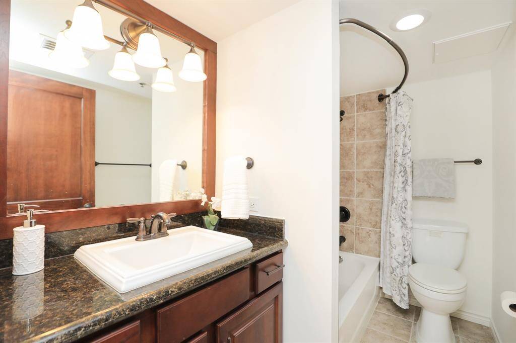 Another lovely full bath for second bedroom and guests.