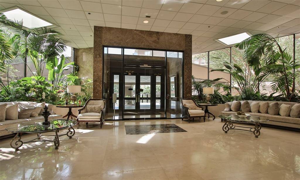 Enter this lovely lobby through secured grand front doors.