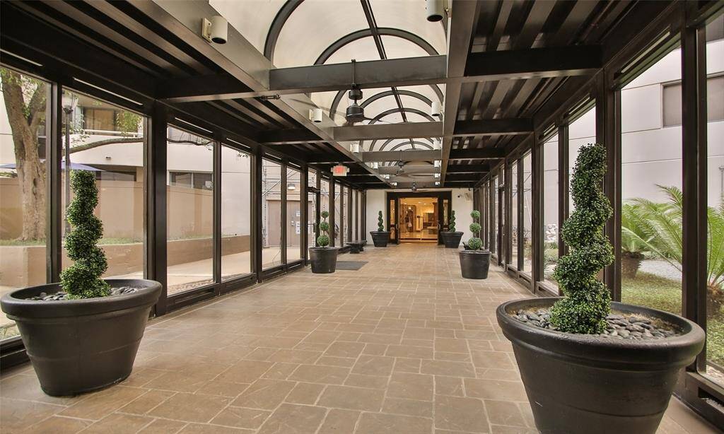 Beautiful stroll from the private parking garage to the building entry with assigned parking and plenty of guest parking as well.