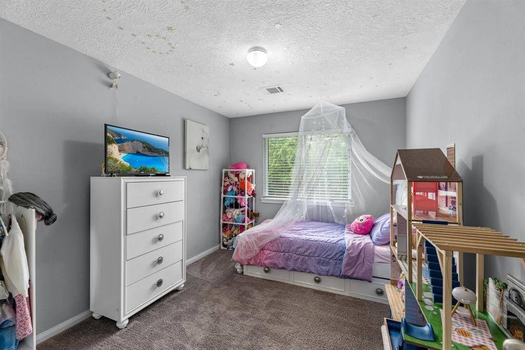 Bedroom #2 has plenty of room for furniture and is conveniently located near the primary bedroom.