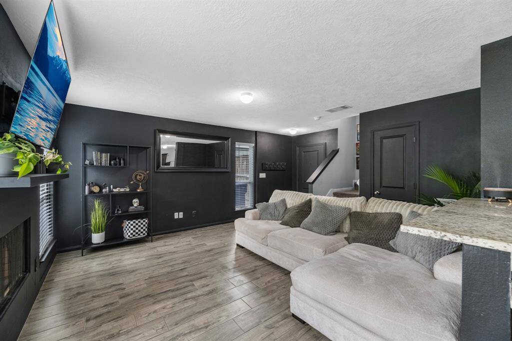 Additional view of the family room from the kitchen breakfast area.
