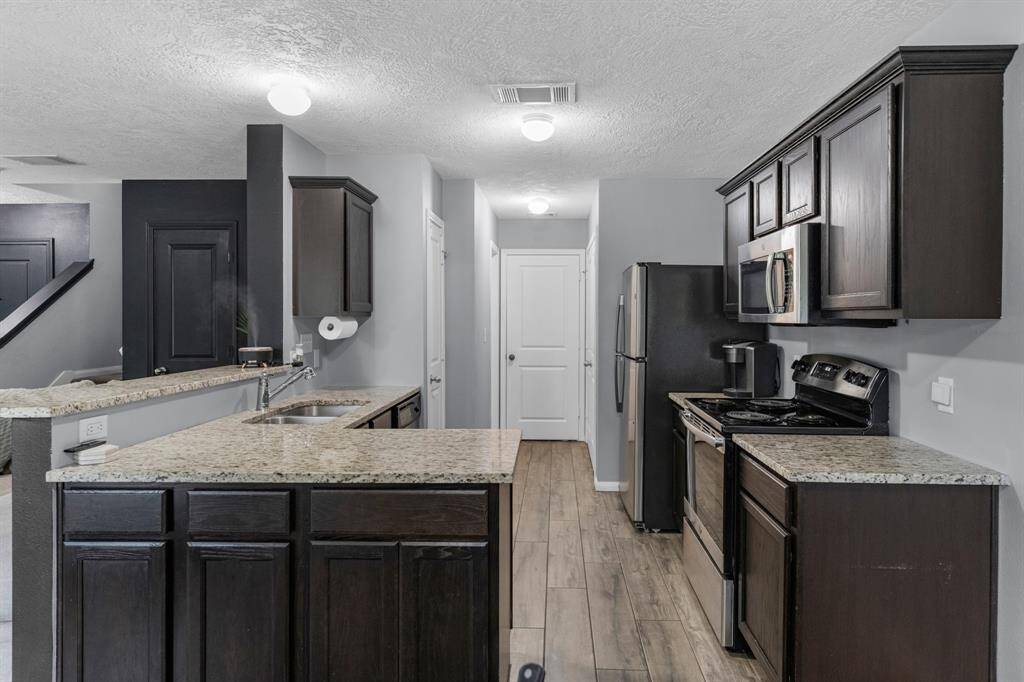 Recent paint in the kitchen and plenty of space to meal prep.