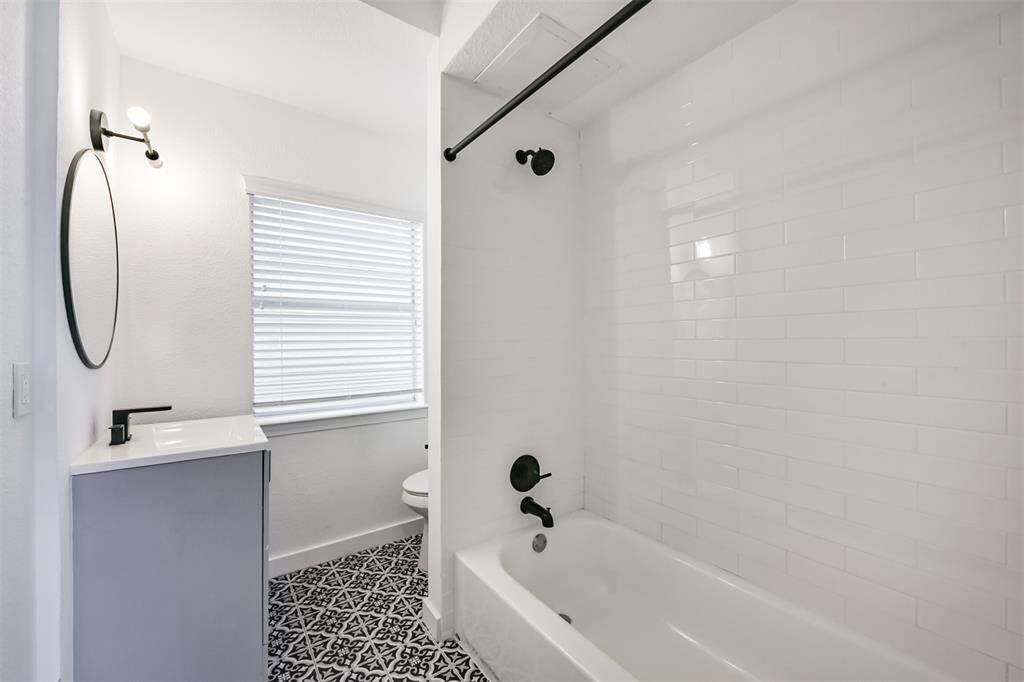 This unit has a tub/shower combo, updated flooring in each unit.