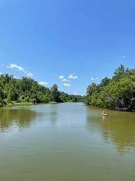land is situated near Harmon Creek and flows into the Trinity River