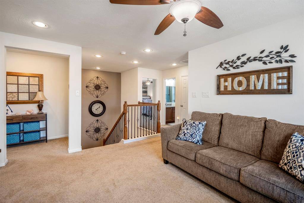 The space is well-lit with recessed lighting.