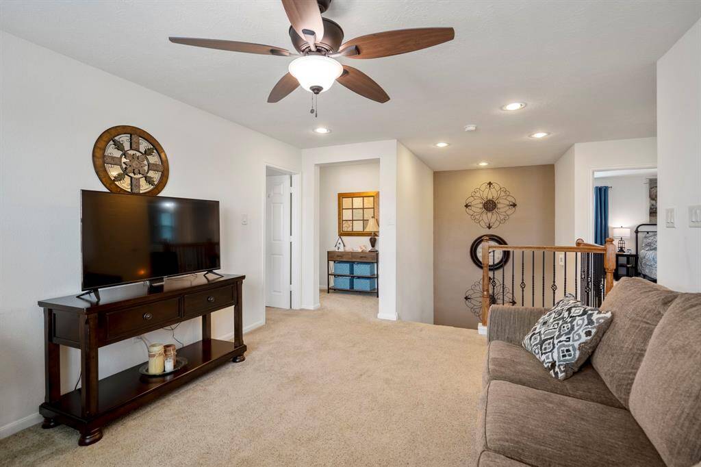 Just off the game room are the upstairs bedrooms.