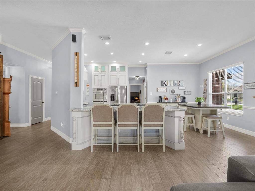 The view of the kitchen from the living area.
