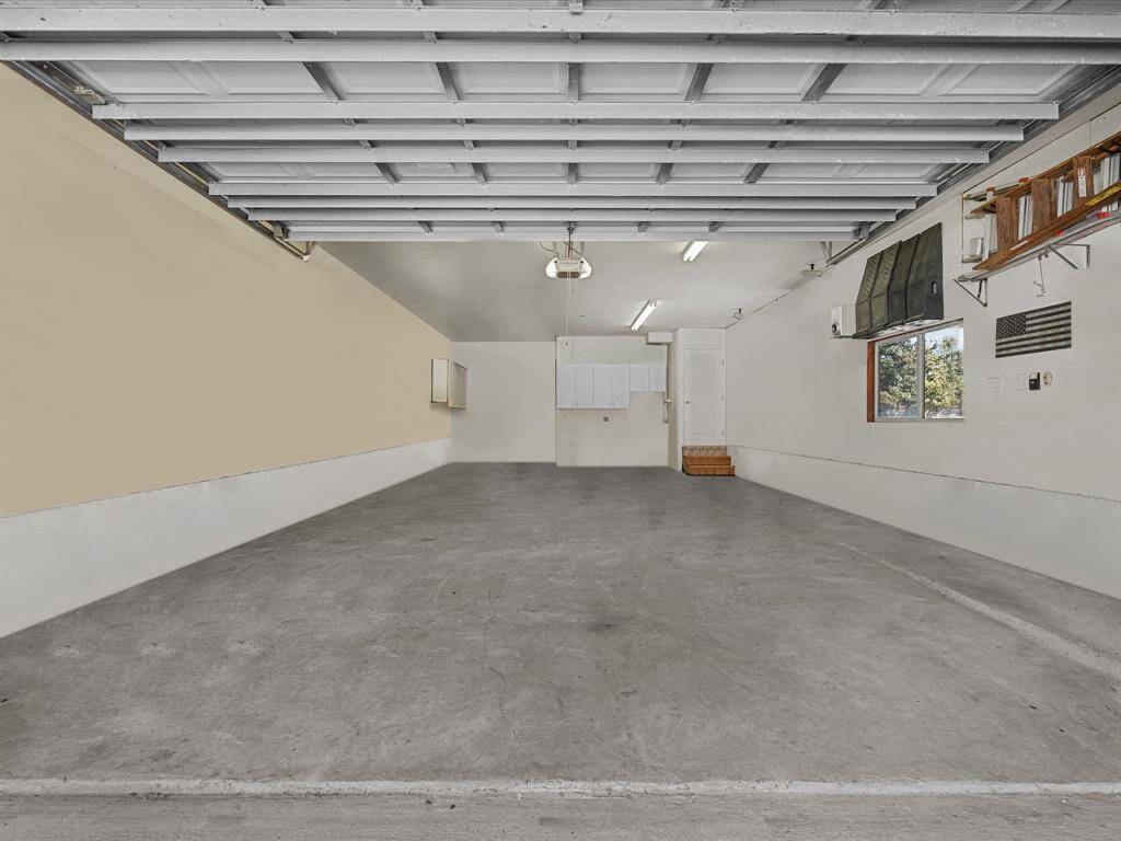 Massive 4 car garage is 40x20 plus air conditioned! This is the garage you have been dreaming of!