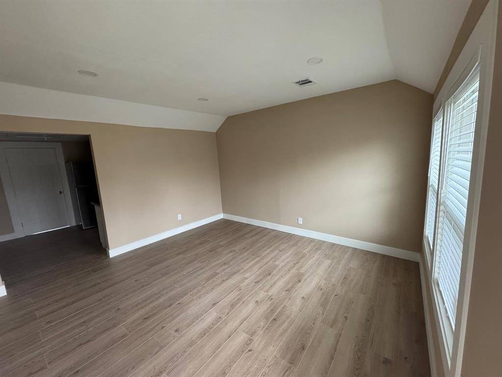 Living room opens to kitchen area