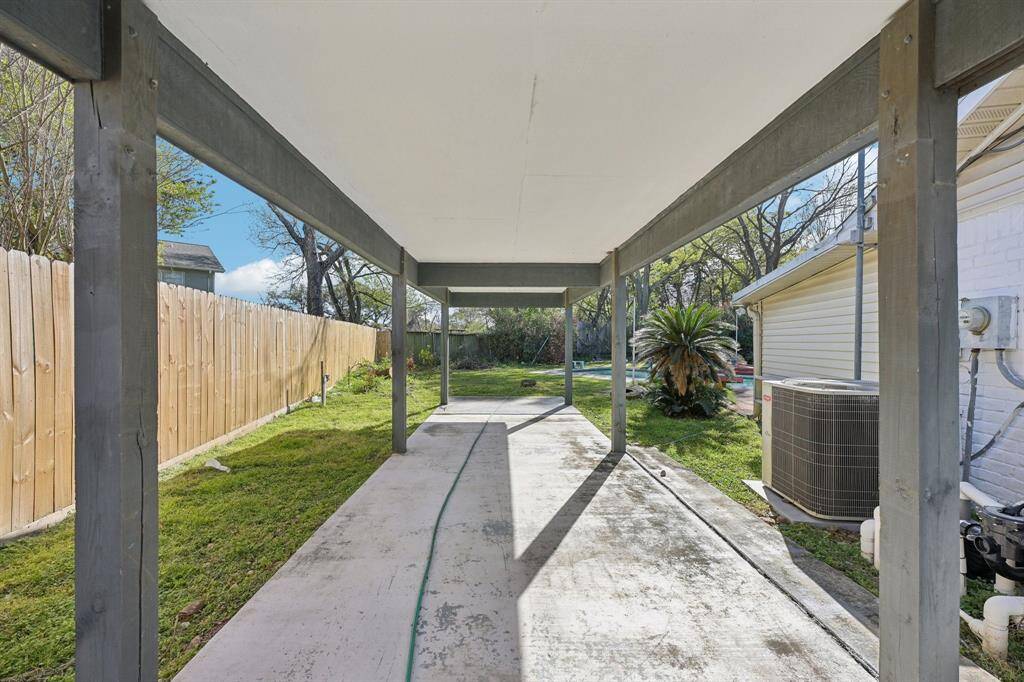 Left side of the home covered porch area