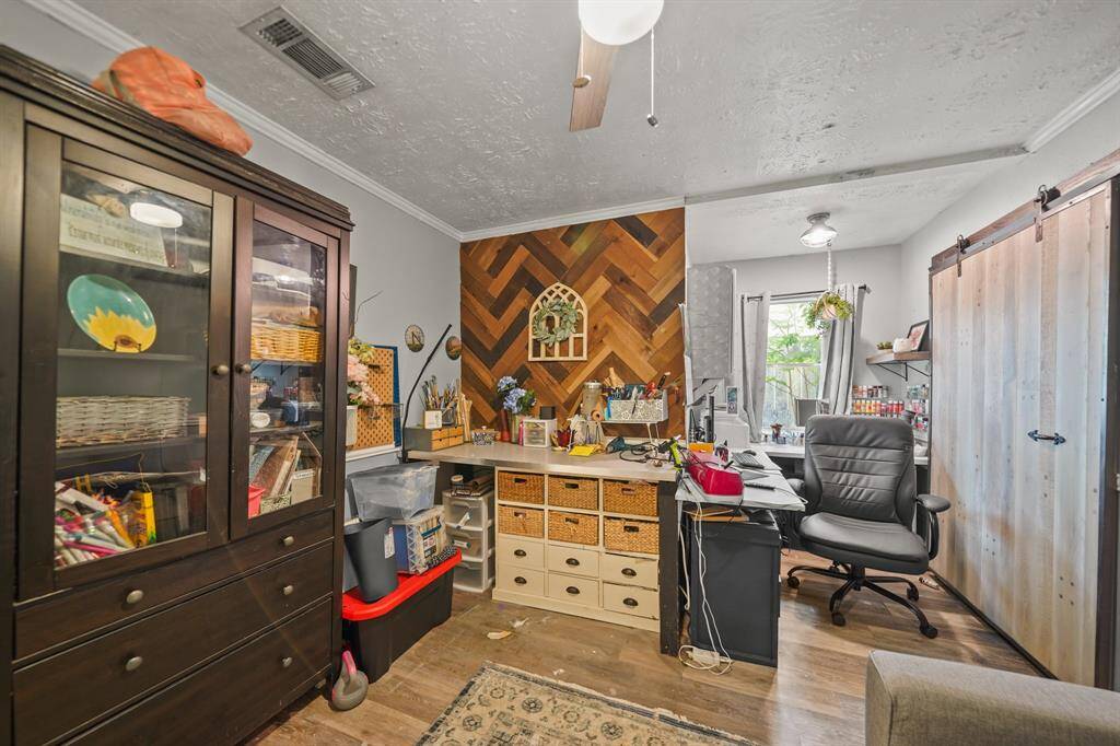 The second bedroom with several built-ins can serve as your home office.