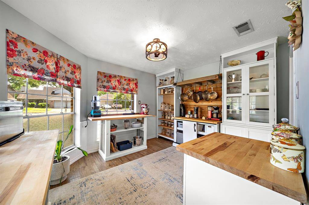 The kitchen was extended into the breakfast area, but there is still space for a bistro table and chairs in addition to plenty of storage.