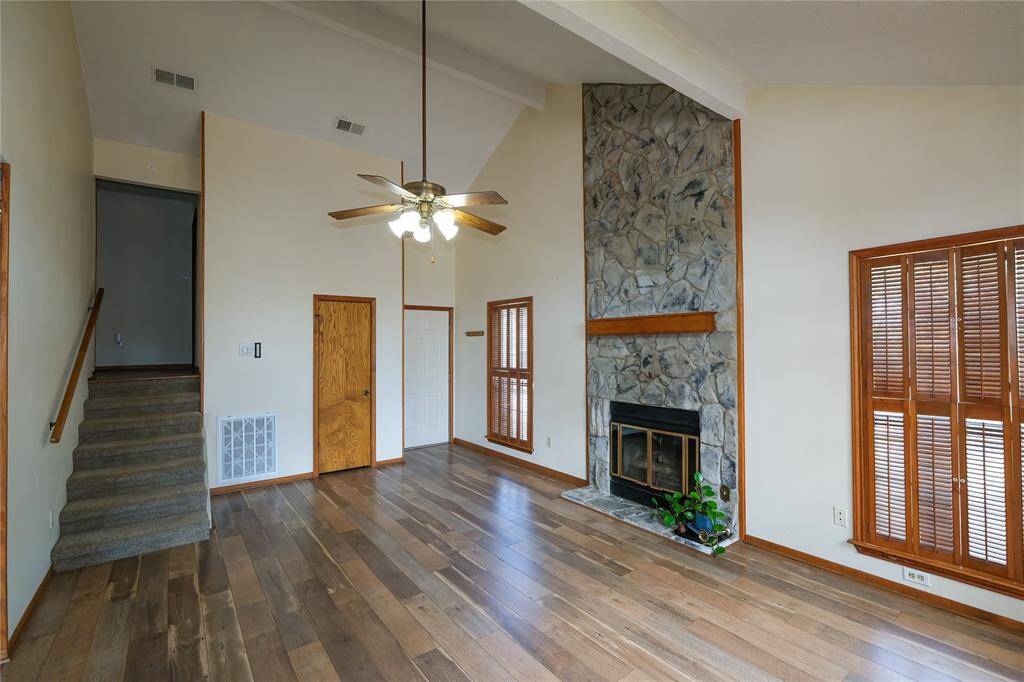 Entering floor 1, living room with fireplace