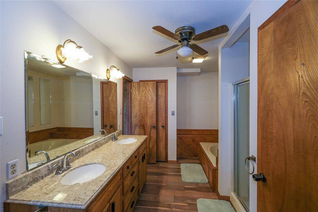 Primary bathroom with soaking tub and shower