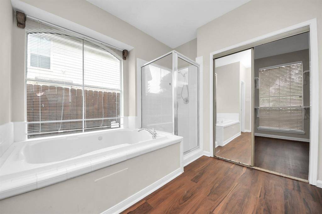 Both tub and shower in Primary