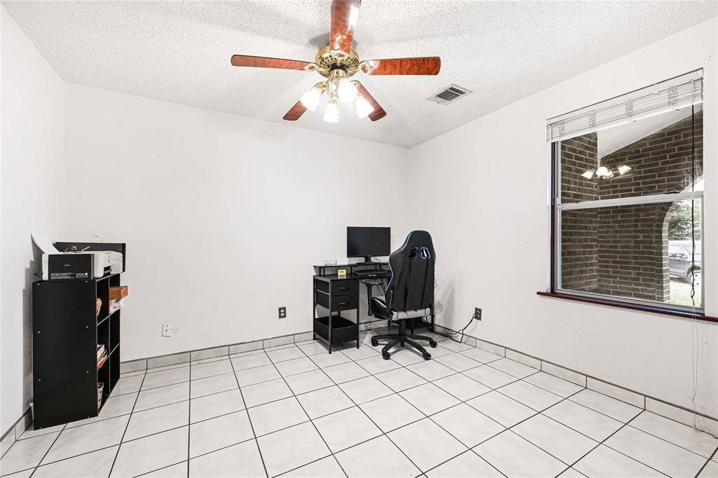 This room can be used as an office or dinning area