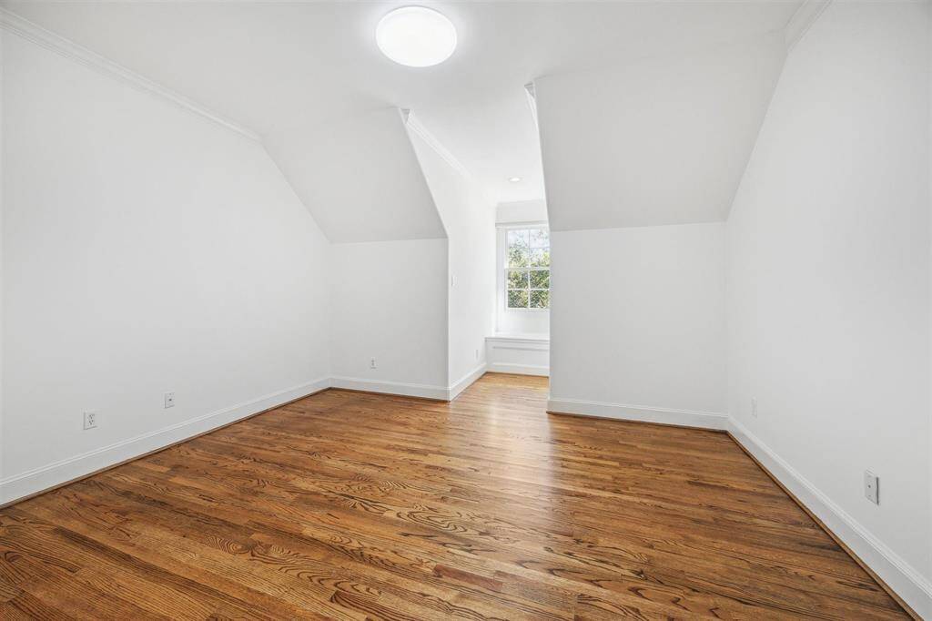 One of three upstairs secondary bedrooms.  This bedroom has a Hollywood bath.