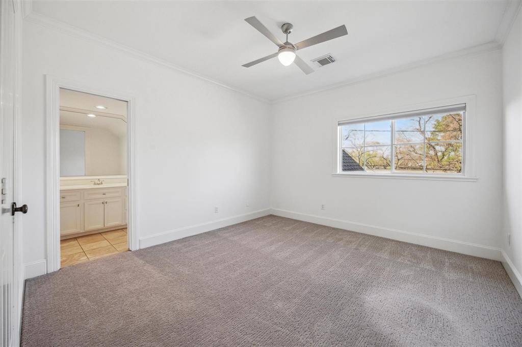 Another upstairs secondary bedroom with Hollywood bath